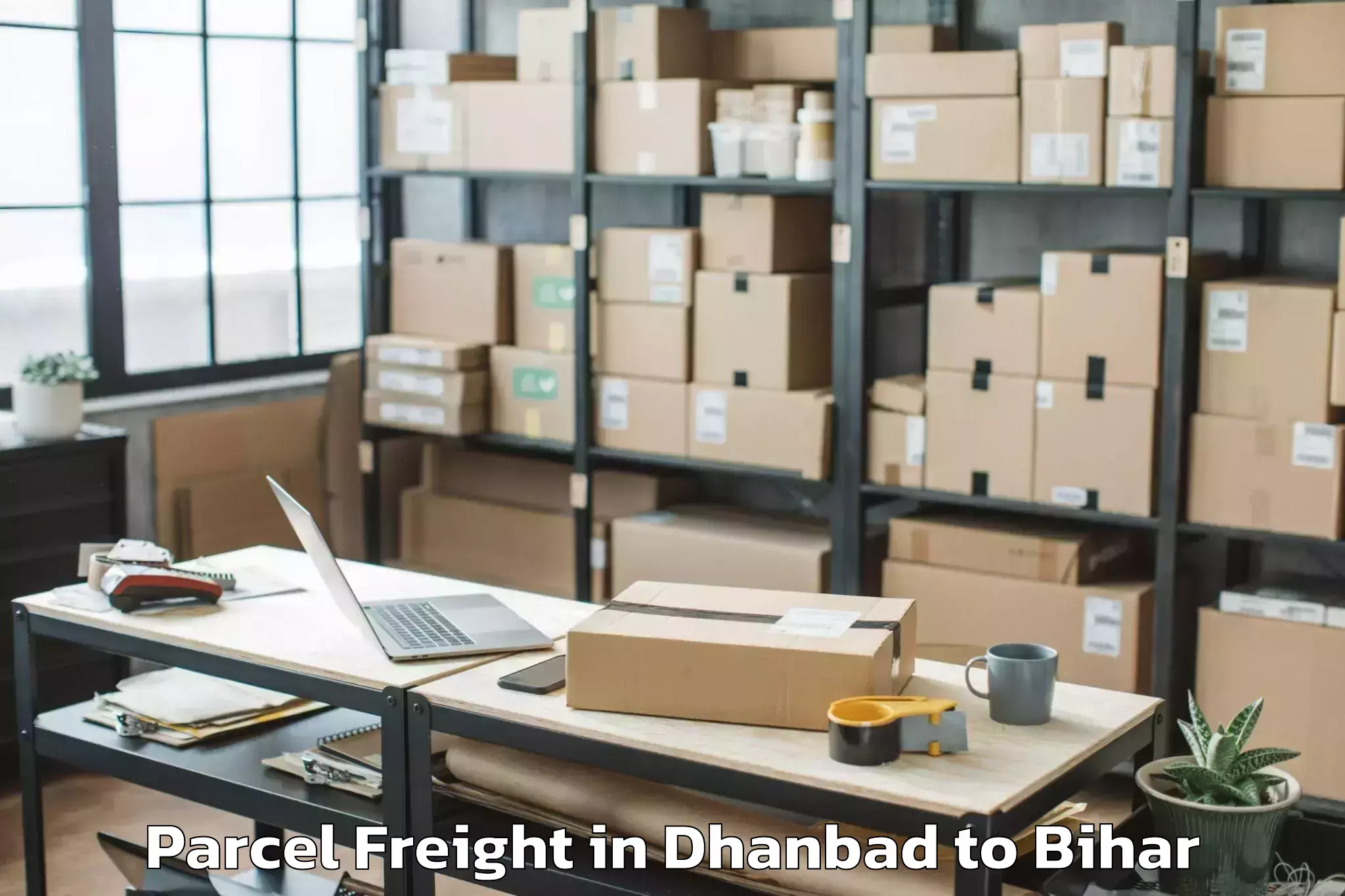 Easy Dhanbad to Mainatand Parcel Freight Booking